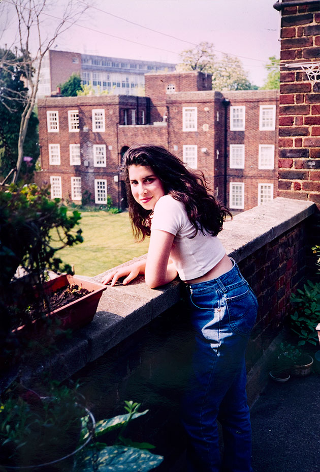 A-young-Amy-outside-her-Nanâs-flat-in-Southgate-Photographer-unknown-c-The-Winehouse-Family